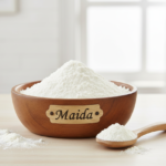 Firefly_Gemini Flash_A wooden bowl labelled as -Maida- full of bright Refined Wheat Flour (Maida)___, the 393750